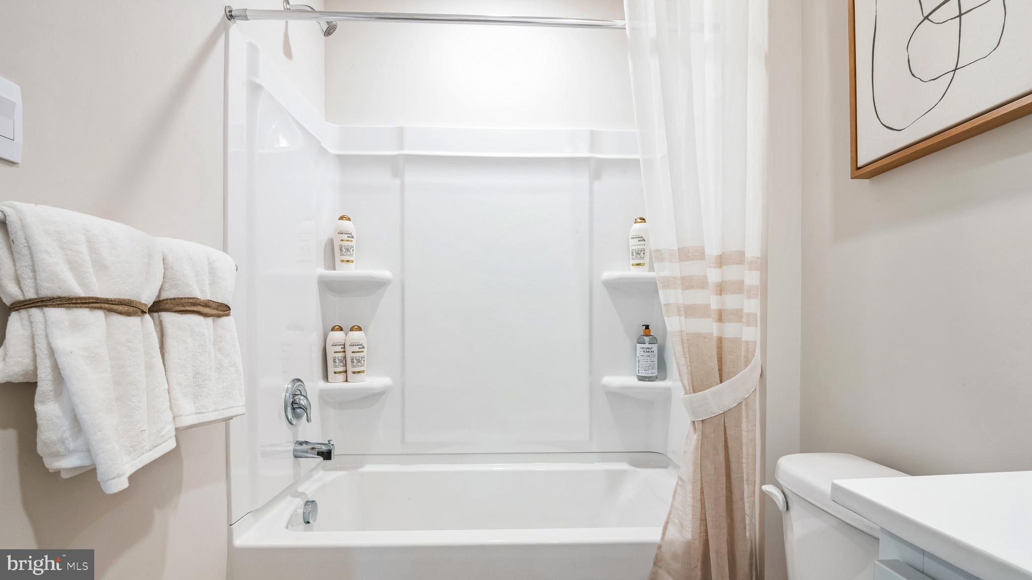 8 Whaler Drive Runnemede, NJ 08078 - Photo 11 of 24 a bathroom with a bathtub and a toilet