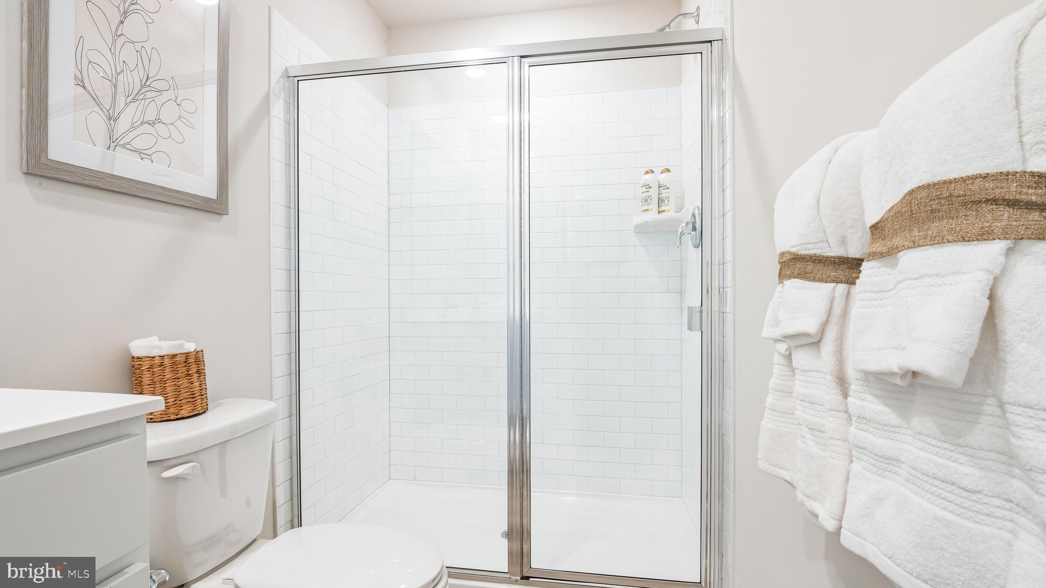 8 Whaler Drive Runnemede, NJ 08078 - Photo 14 of 24 a bathroom with a shower and a toilet