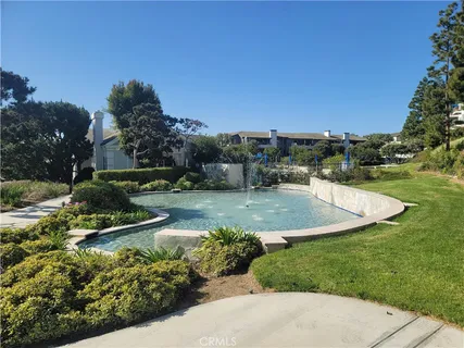 a view of a lake with a yard