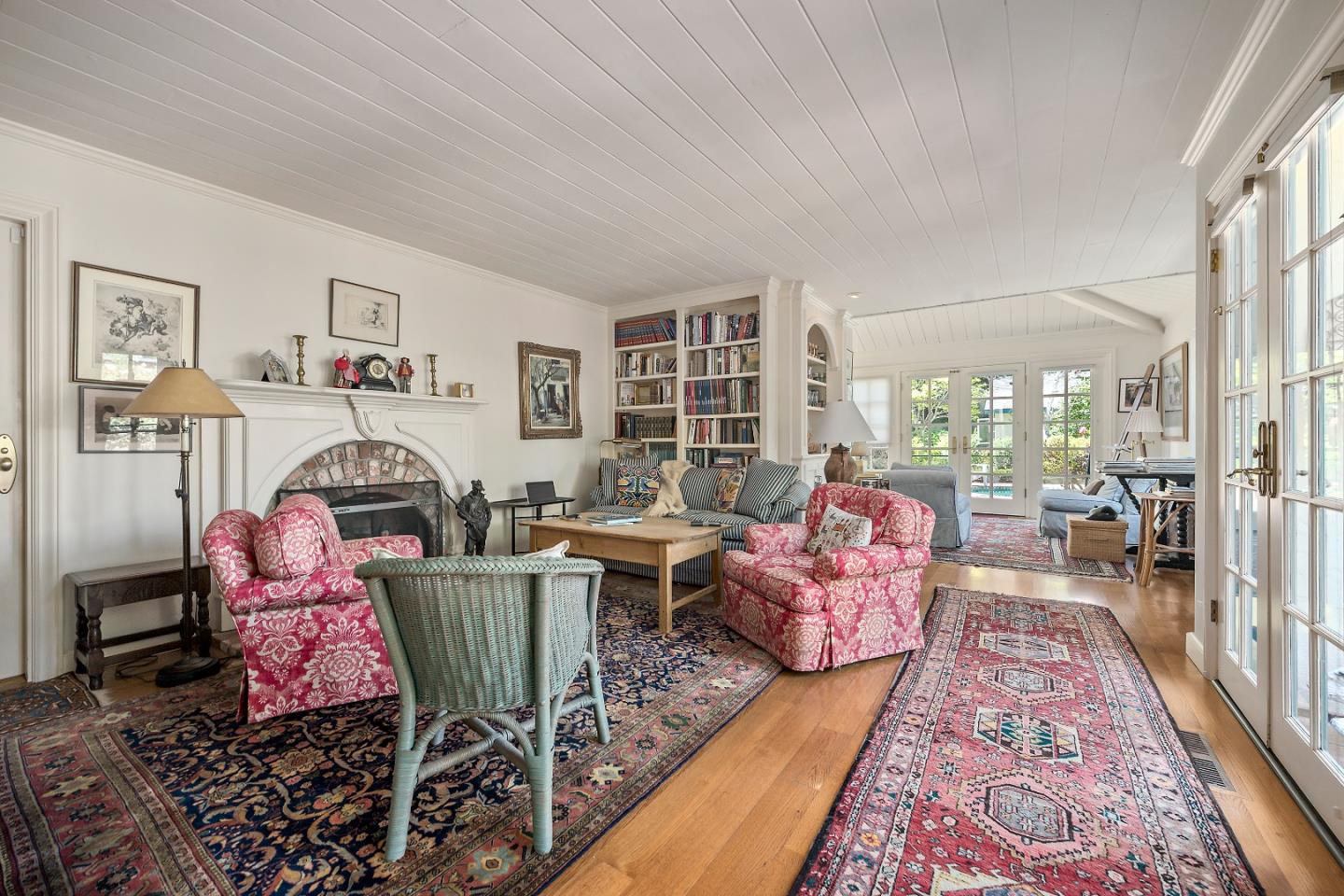 72 Winchester Drive Atherton, CA 94027 - Photo 14 of 50 a living room with furniture and a fireplace
