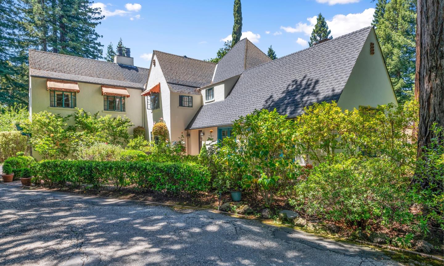 72 Winchester Drive Atherton, CA 94027 - Photo 2 of 50 front view of a house with a yard and potted plants