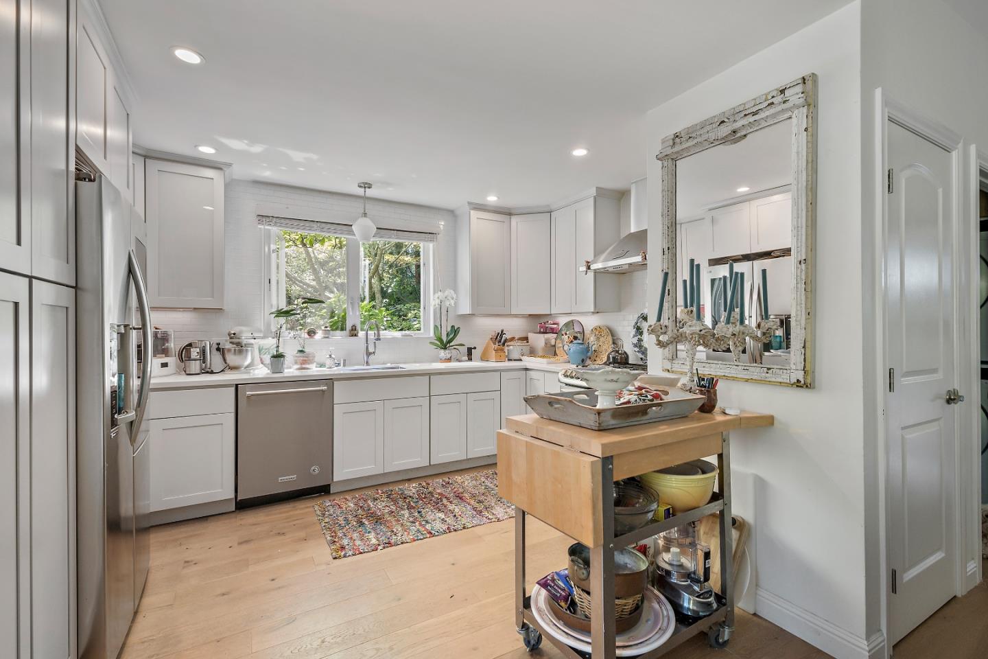 72 Winchester Drive Atherton, CA 94027 - Photo 34 of 50 a kitchen with a sink stove and refrigerator