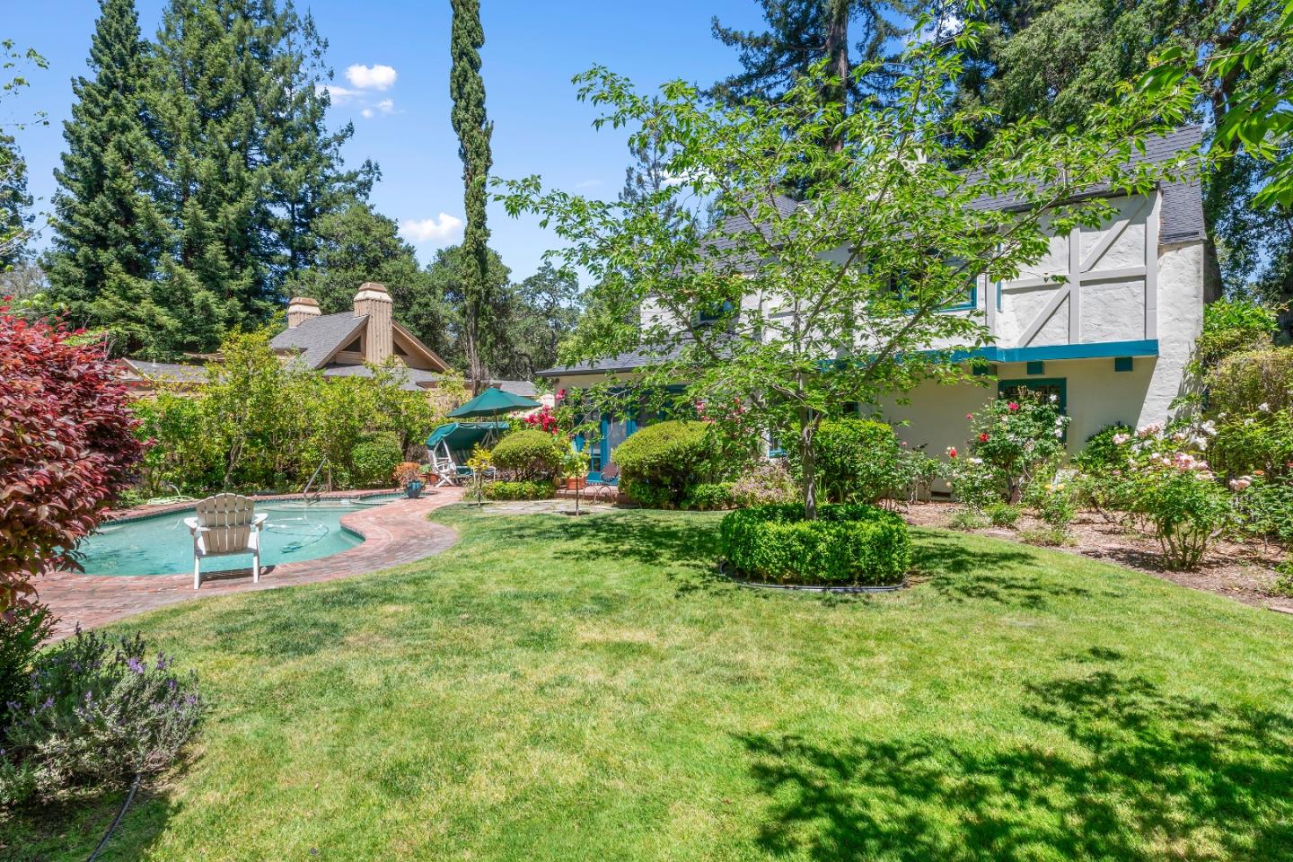 72 Winchester Drive Atherton, CA 94027 - Photo 37 of 50 a view of a house with a yard and sitting area