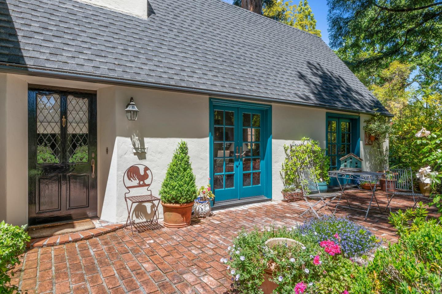 72 Winchester Drive Atherton, CA 94027 - Photo 4 of 50 a front view of a house with a porch