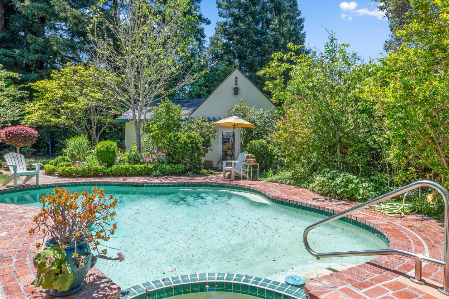 72 Winchester Drive Atherton, CA 94027 - Photo 41 of 50 a backyard of a house with a yard and outdoor seating