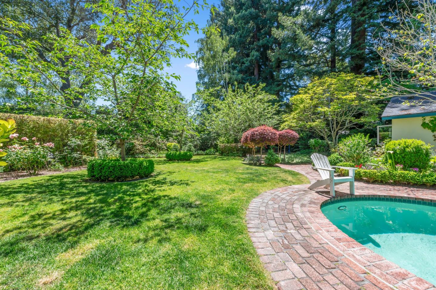 72 Winchester Drive Atherton, CA 94027 - Photo 44 of 50 a view of a garden with a patio