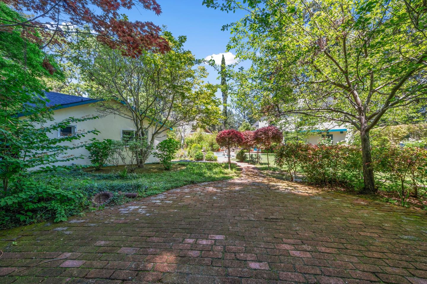 72 Winchester Drive Atherton, CA 94027 - Photo 46 of 50 a view of a yard with plants and trees