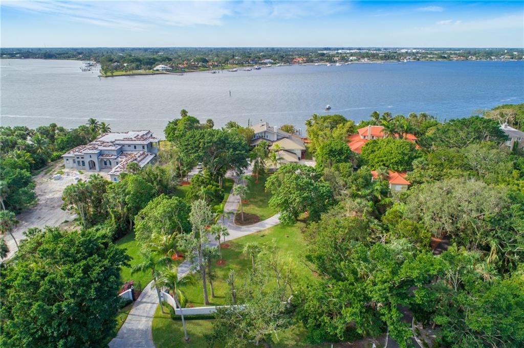 137 South River Road Stuart, FL 34996 - Photo 51 of 55 an aerial view of a houses with outdoor space and ocean view