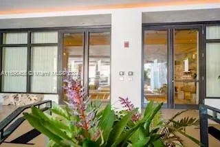 a bathroom with a tub and shower