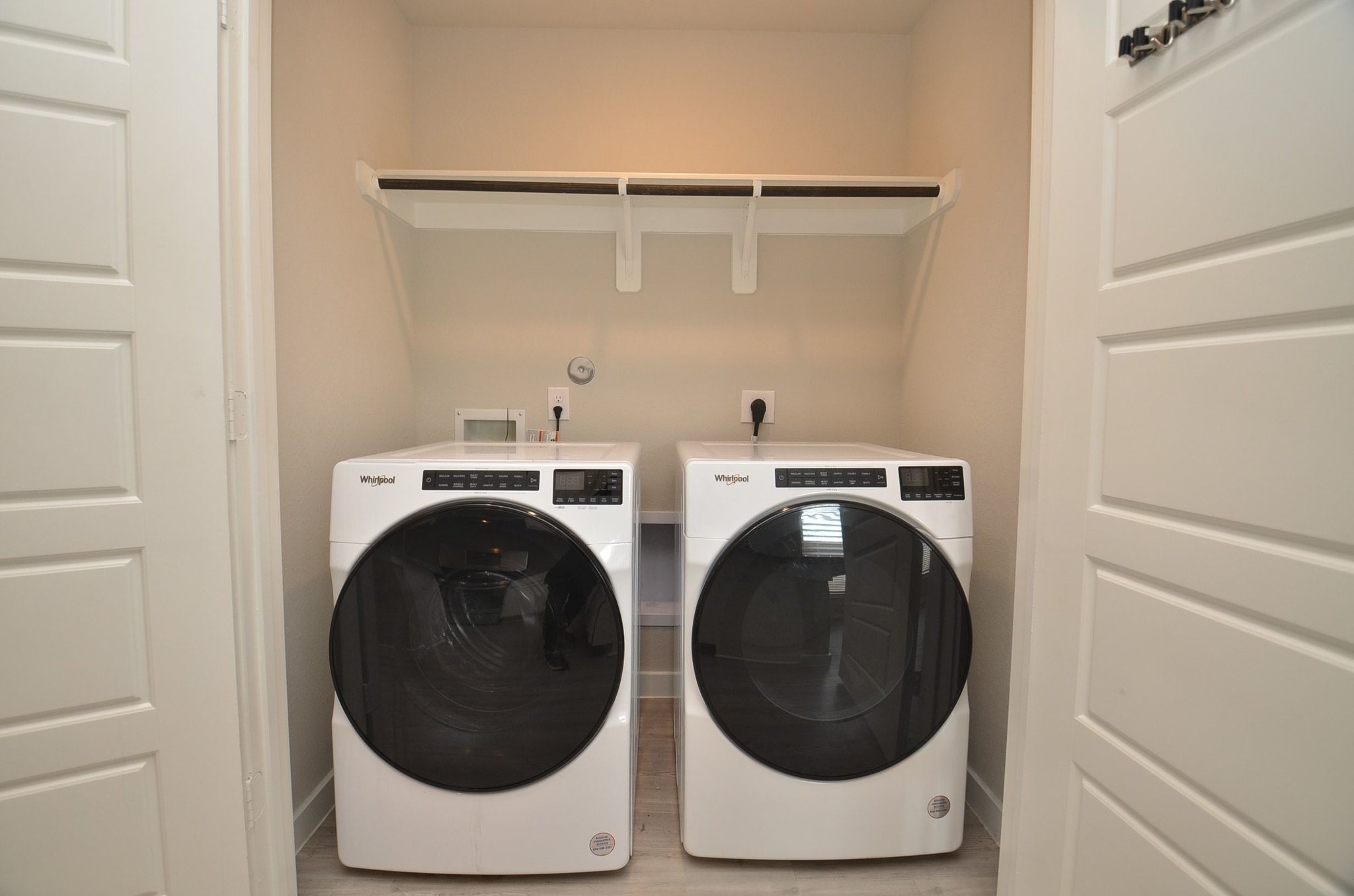 8230 Blue Fish Drive Cypress, TX 77433 - Photo 14 of 18 Washer and dryer are included and conveniently located near the kitchen.