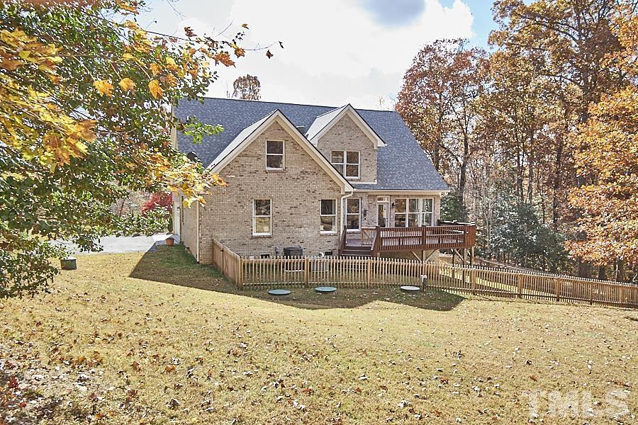 243 Rassie Crabtree Road Rougemont, NC 27572 - Photo 30 of 30 a view of house with yard