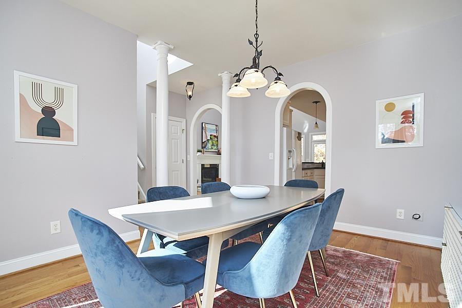 243 Rassie Crabtree Road Rougemont, NC 27572 - Photo 6 of 30 a view of a dining room with a table and chairs