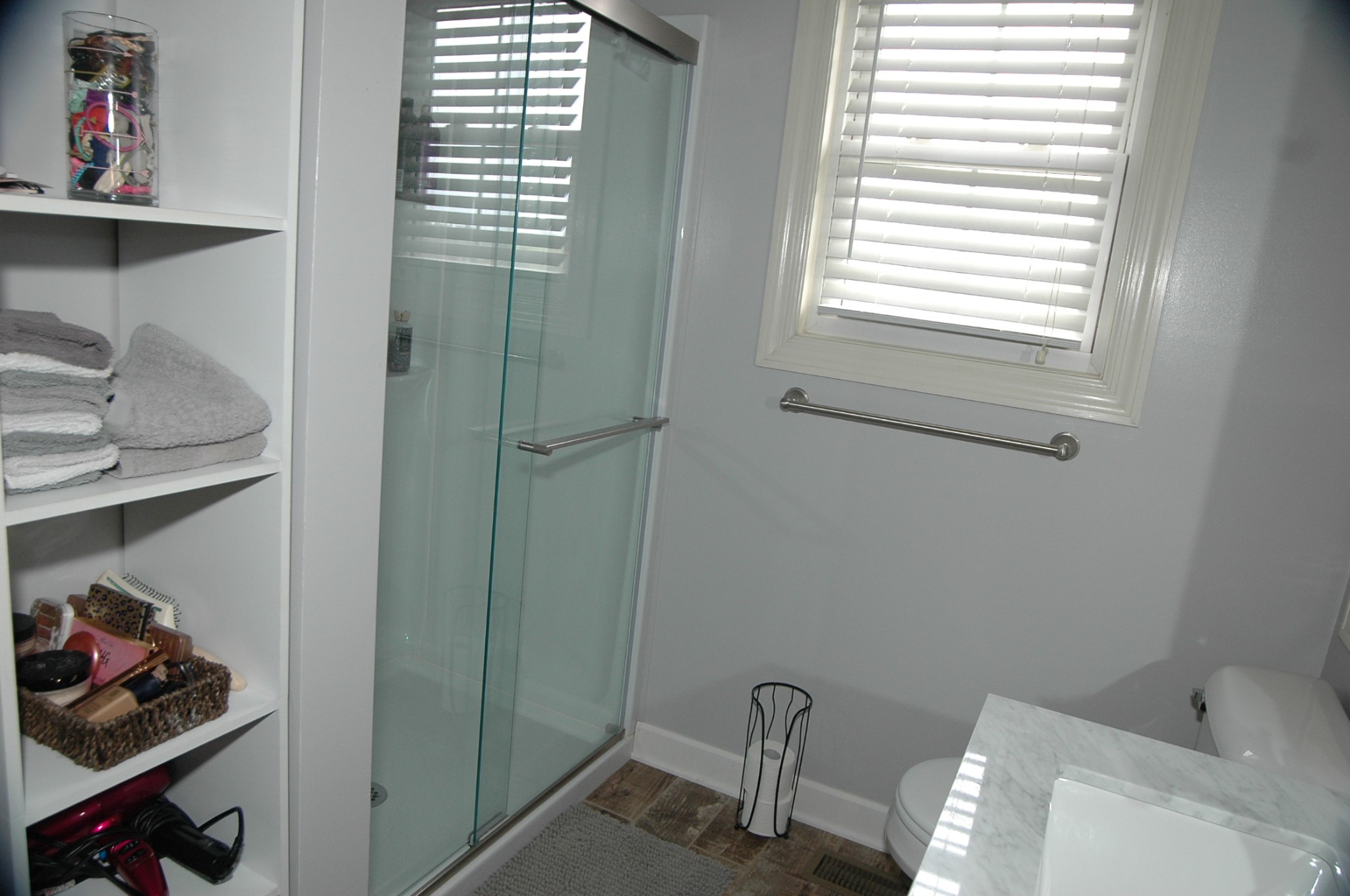 4607 Washington Road Greenbrier, TN 37073 - Photo 15 of 40 a bathroom with a window and a toilet