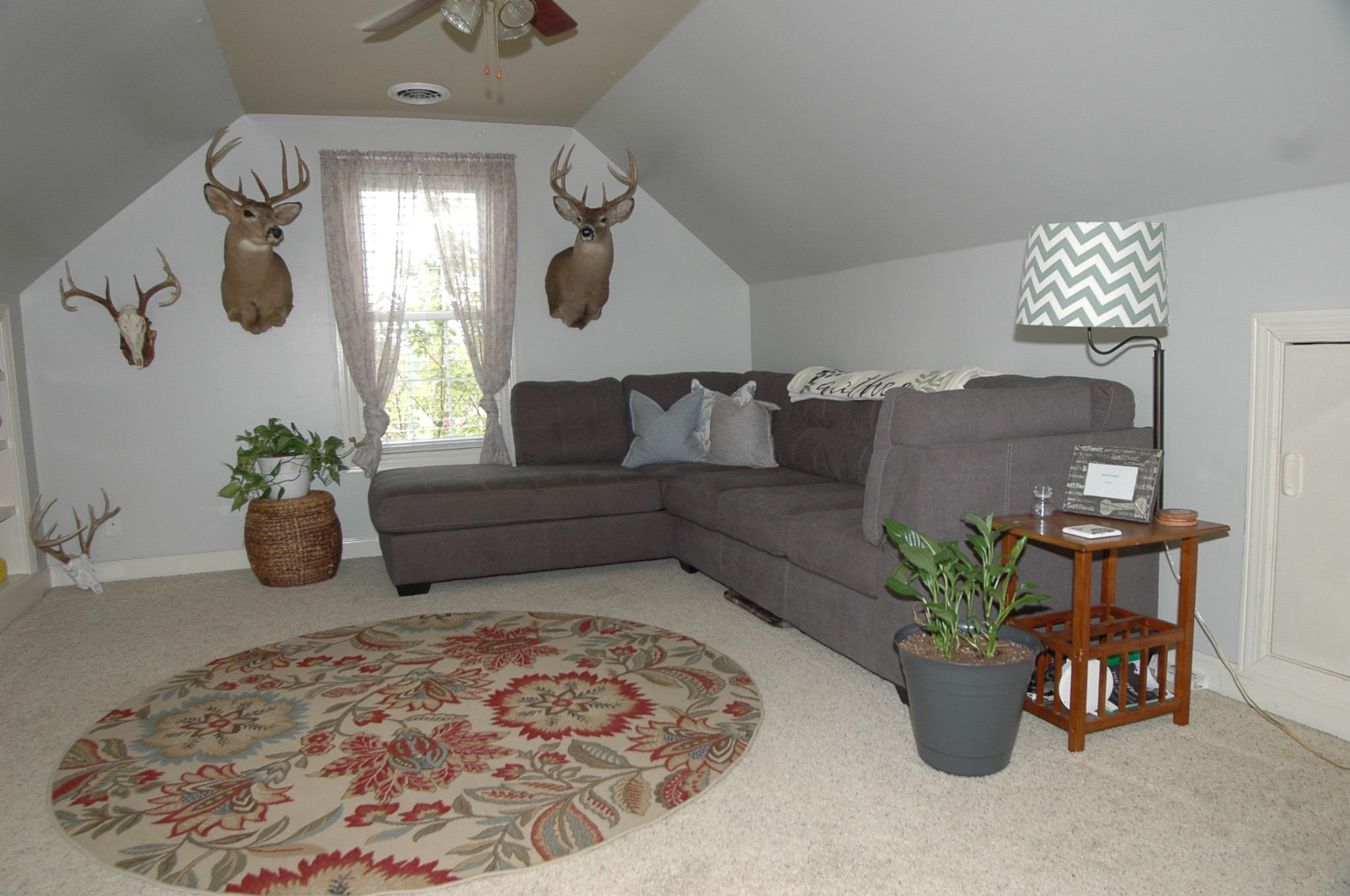 4607 Washington Road Greenbrier, TN 37073 - Photo 24 of 40 a living room with furniture and a potted plant