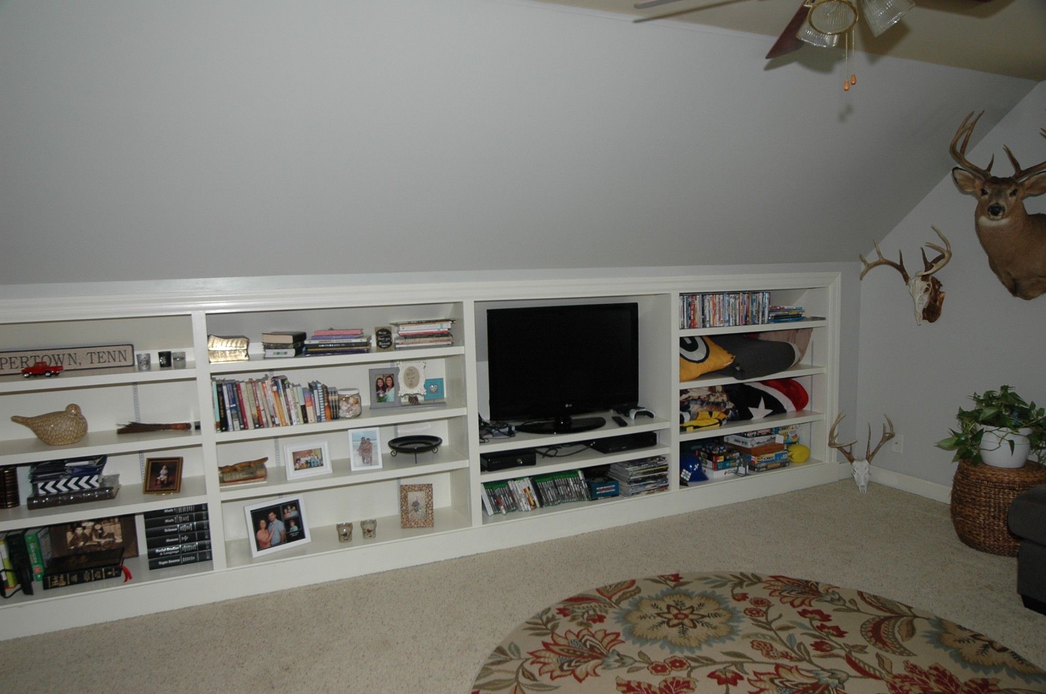 4607 Washington Road Greenbrier, TN 37073 - Photo 26 of 40 a living room with furniture and a flat screen tv