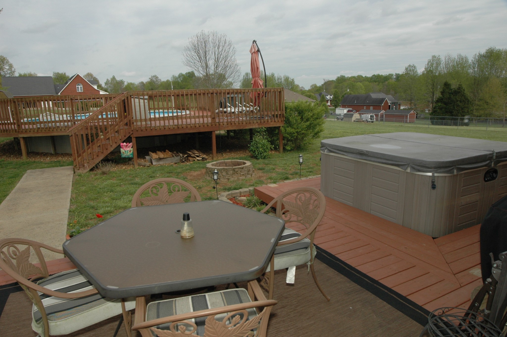4607 Washington Road Greenbrier, TN 37073 - Photo 35 of 40 a view of a terrace with a table and chairs