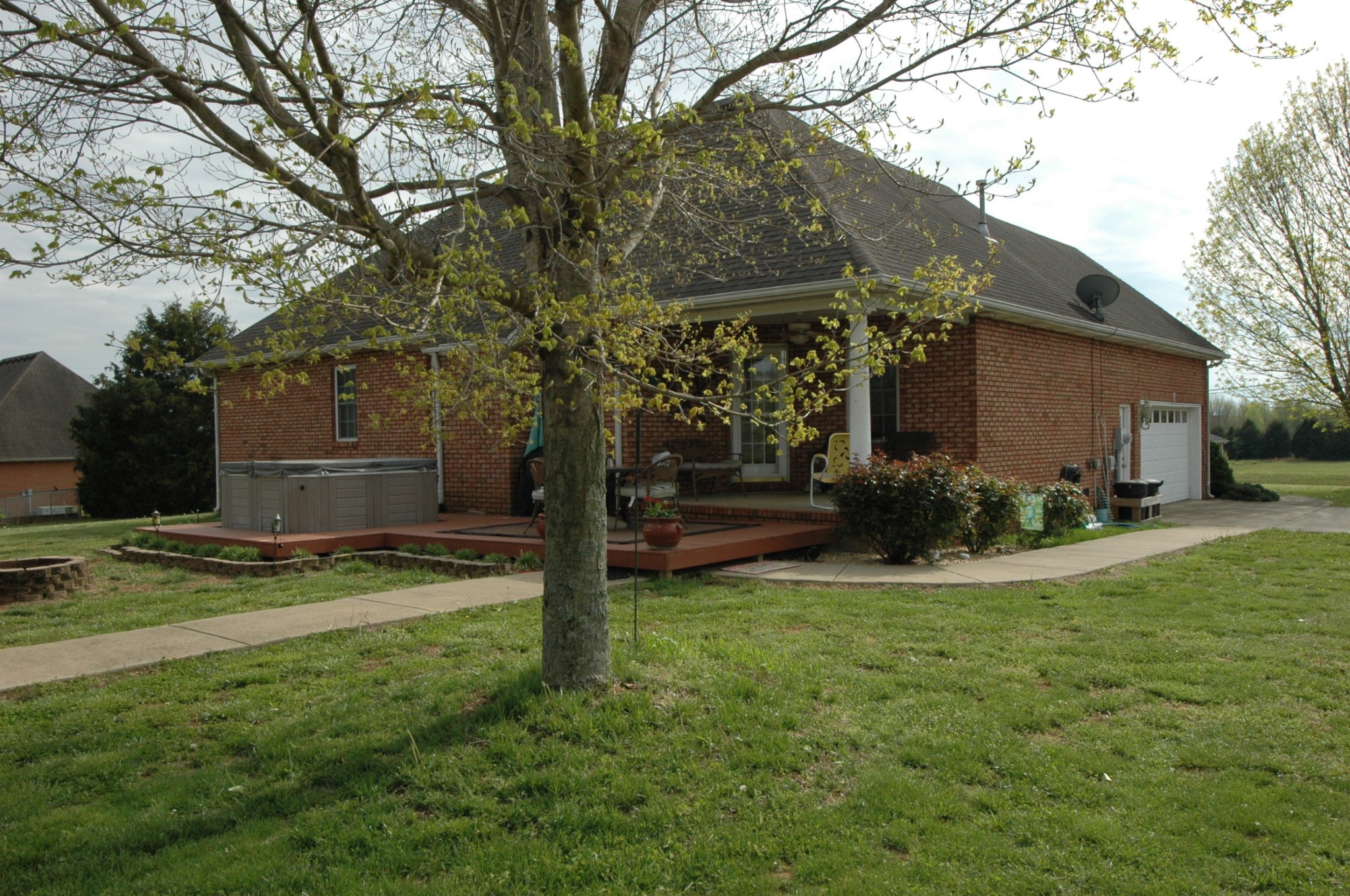 4607 Washington Road Greenbrier, TN 37073 - Photo 38 of 40 a view of a house with backyard and trees