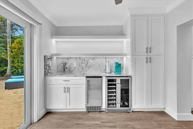 a view of kitchen with furniture and window