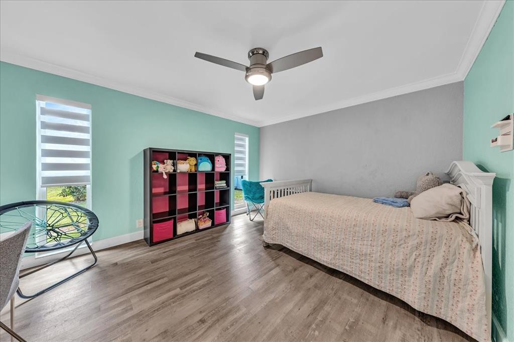 2931 Southwest 108th Way Davie, FL 33328 - Photo 26 of 36 a bedroom with a bed and a window