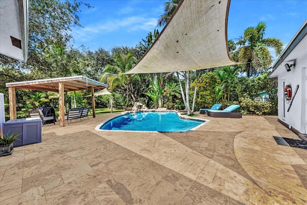 2931 Southwest 108th Way Davie, FL 33328 - Photo 30 of 36 a view of a backyard with a patio