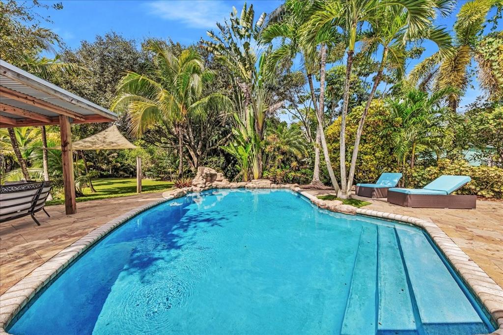 2931 Southwest 108th Way Davie, FL 33328 - Photo 31 of 36 a view of a backyard with swimming pool