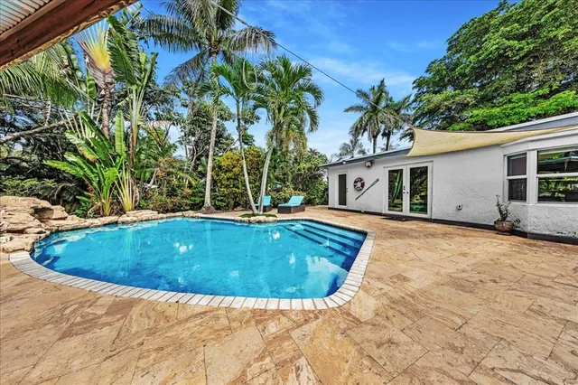 a view of outdoor space yard and swimming pool