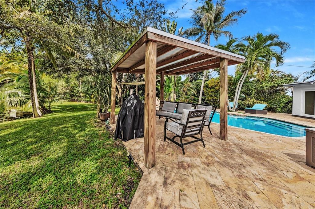 2931 Southwest 108th Way Davie, FL 33328 - Photo 33 of 36 a view of a chairs and table in the patio