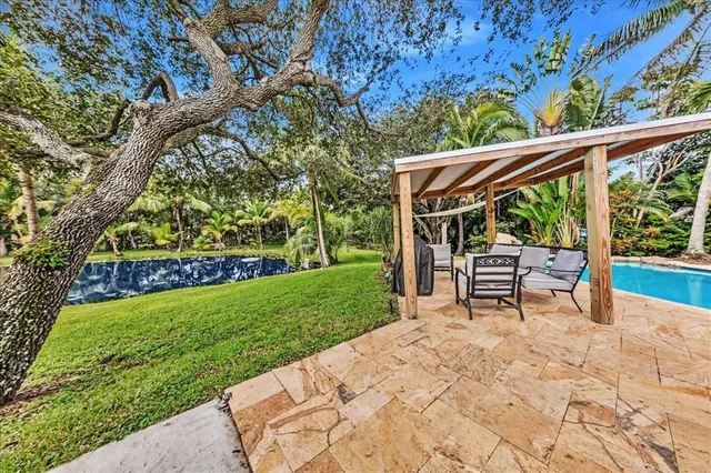 a garden view with a seating space