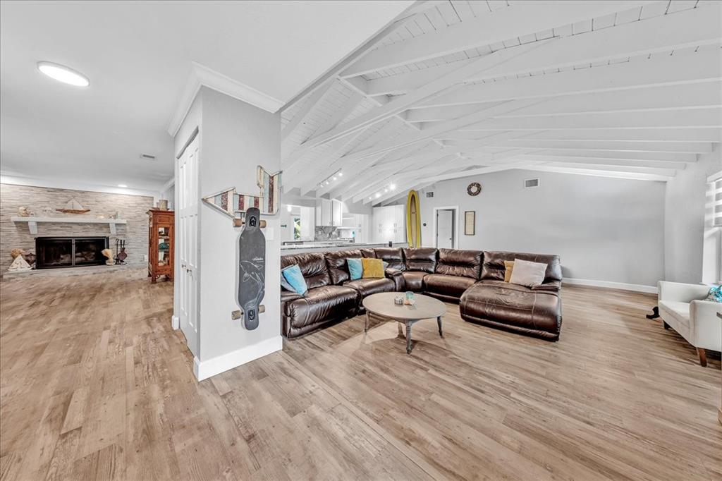 2931 Southwest 108th Way Davie, FL 33328 - Photo 7 of 36 a living room with furniture and a wooden floor