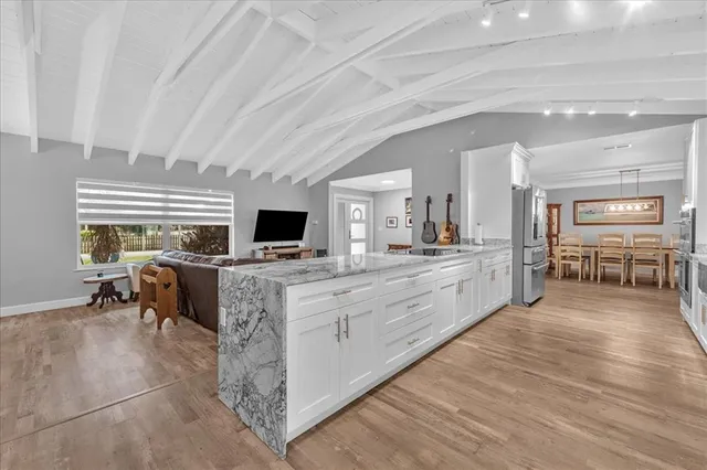 a large room with lots of table and chairs