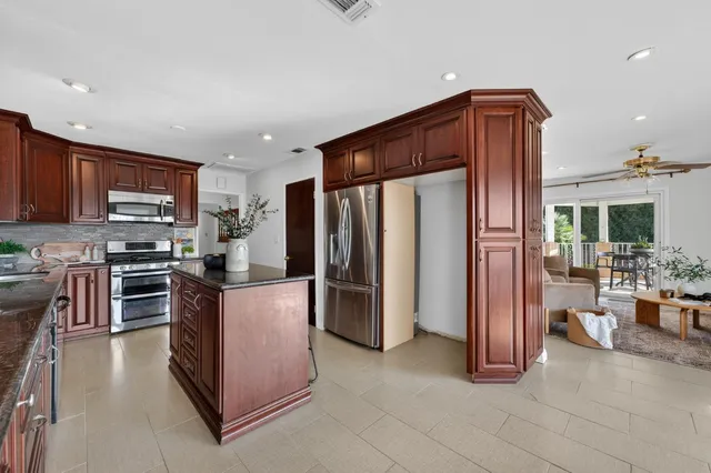 a view of a swimming pool with a patio