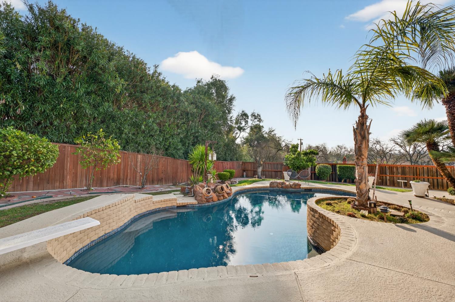 3006 Scenic Heights Way Carmichael, CA 95608 - Photo 57 of 76 a view of a swimming pool with a patio
