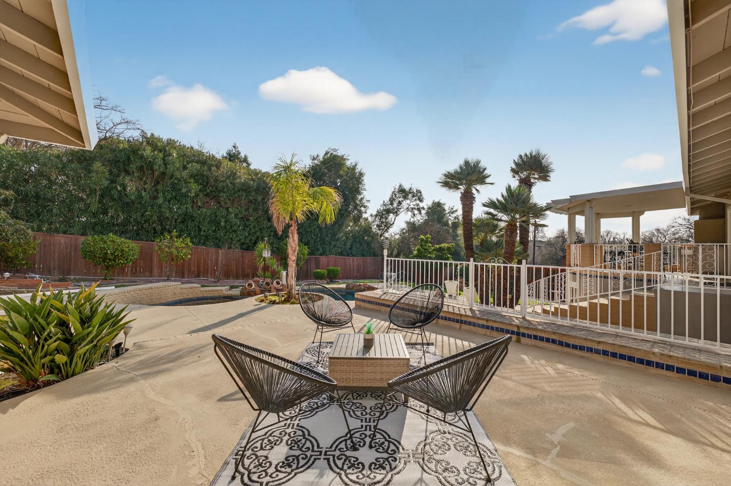 3006 Scenic Heights Way Carmichael, CA 95608 - Photo 59 of 76 a view of a patio with a table and chairs