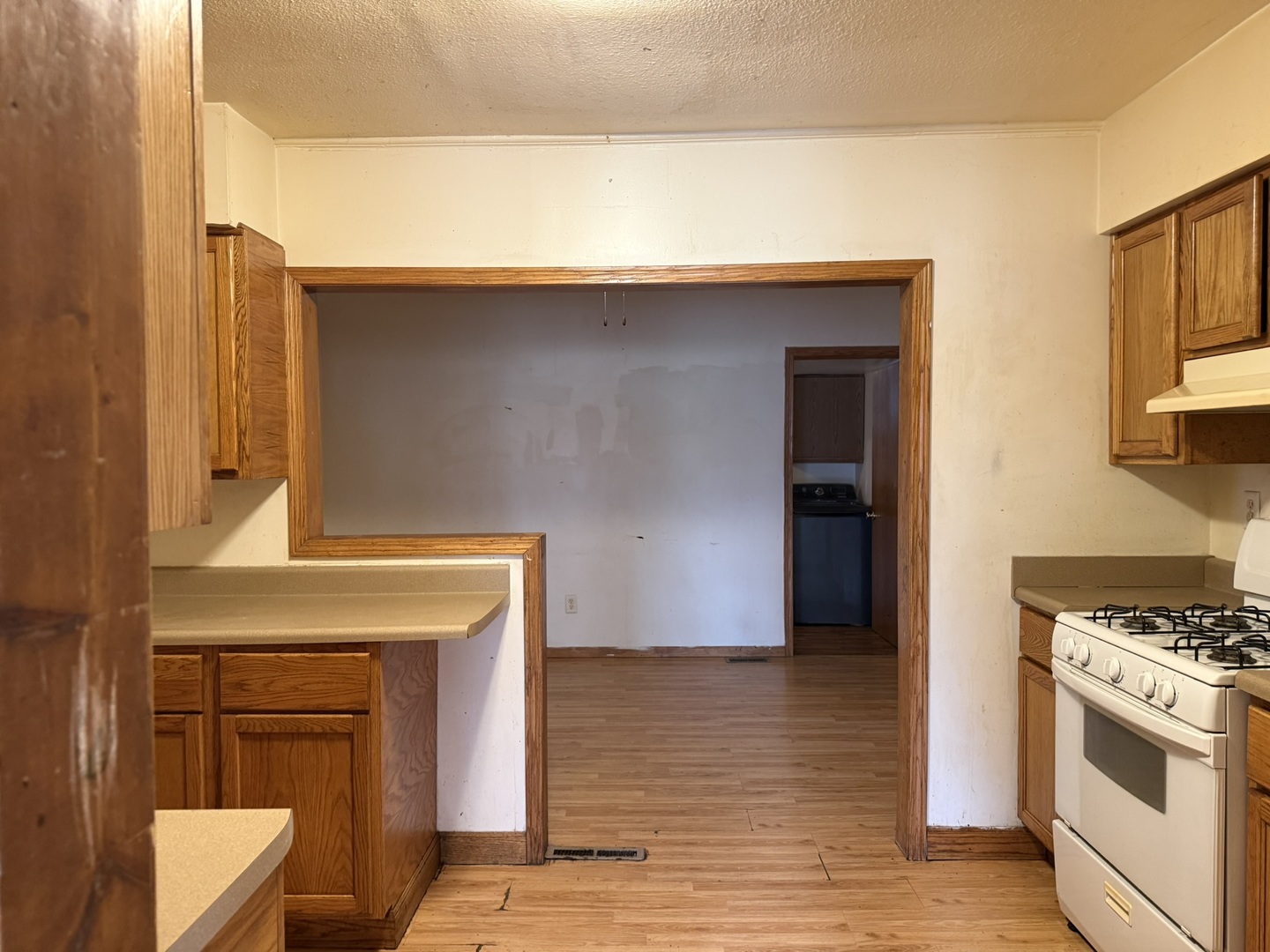 3245 9th Street Rockford, IL 61109 - Photo 14 of 26 a kitchen with a stove and a microwave