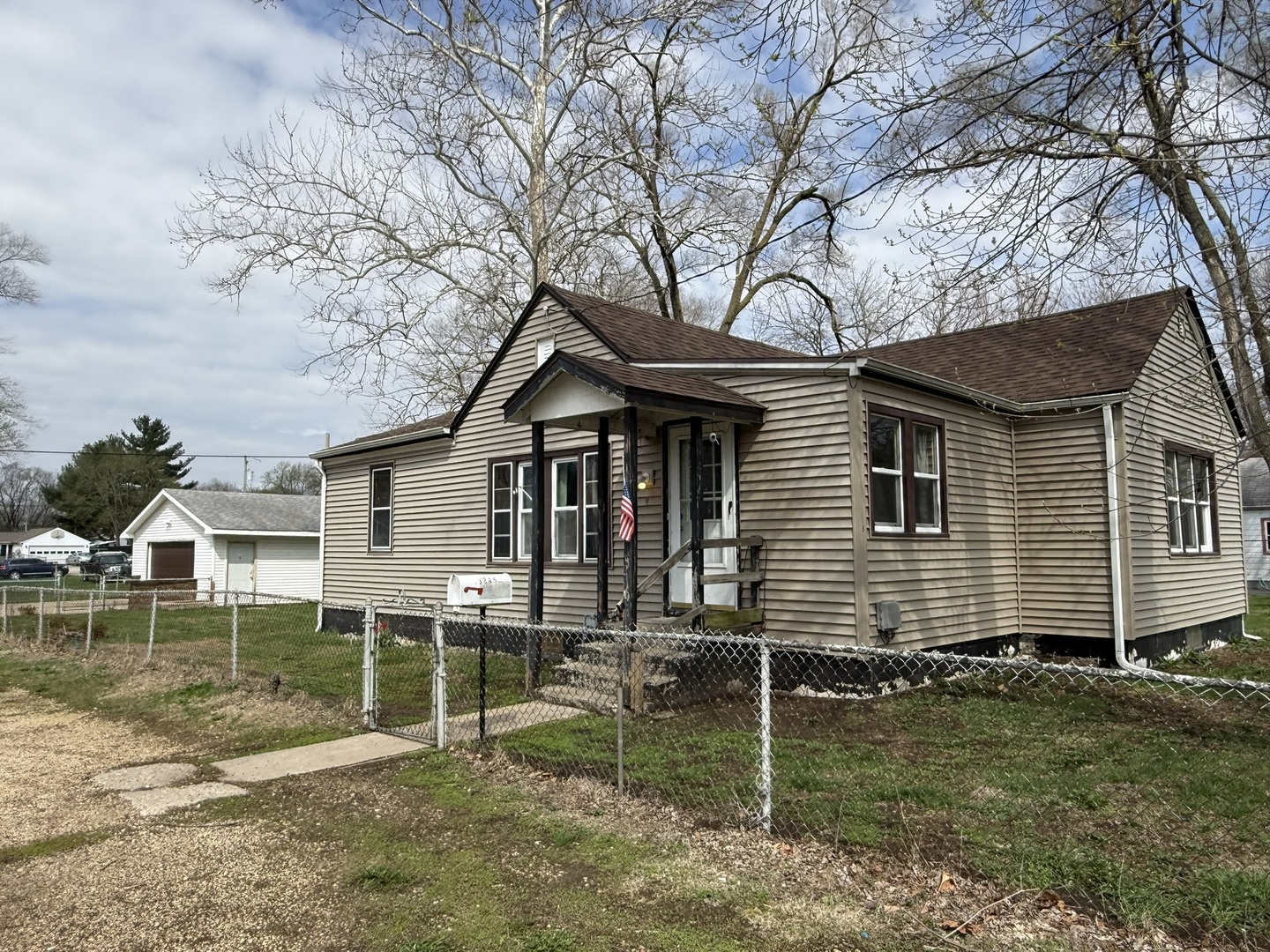 3245 9th Street Rockford, IL 61109 - Photo 2 of 26 front view of a house with a yard