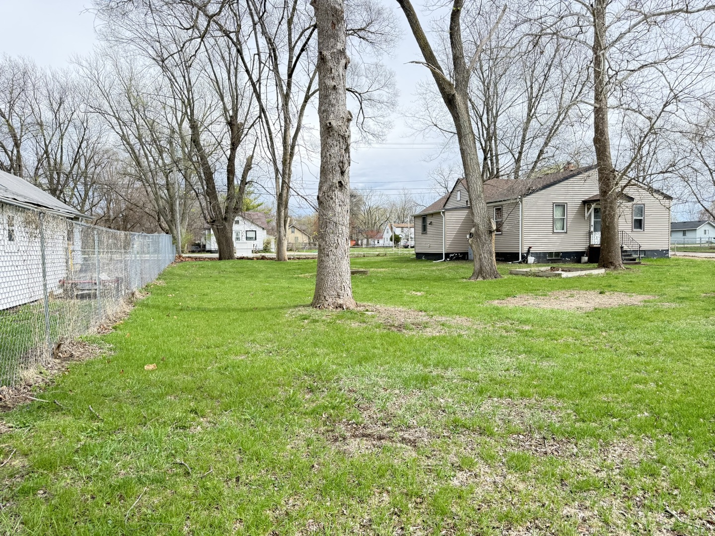 3245 9th Street Rockford, IL 61109 - Photo 7 of 26 a view of a yard with a house