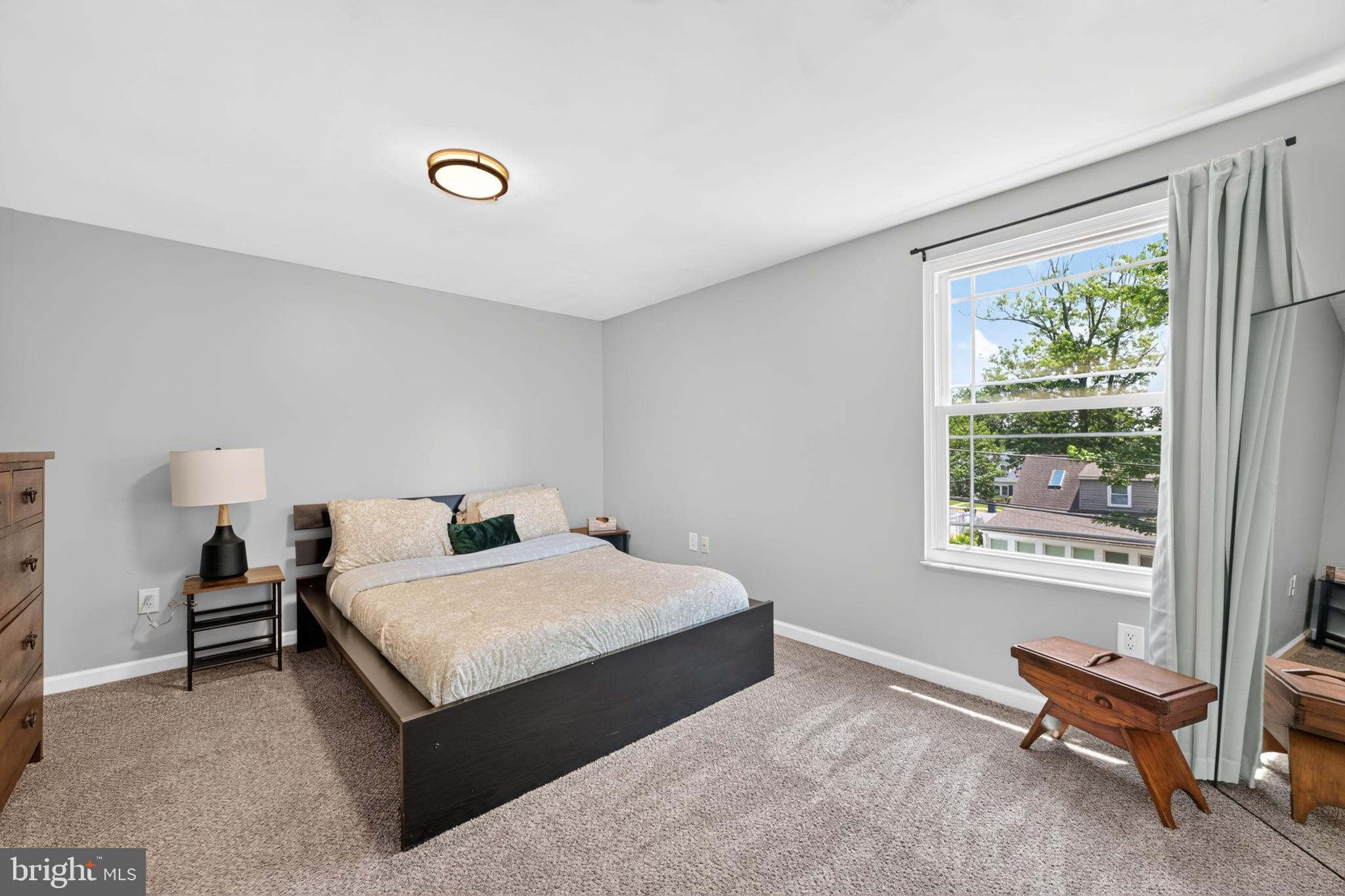 607 Prospect Avenue Morrisville, PA 19067 - Photo 23 of 35 a bedroom with a bed and a window