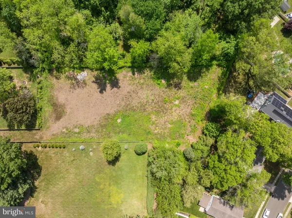 a view of a lake with a yard