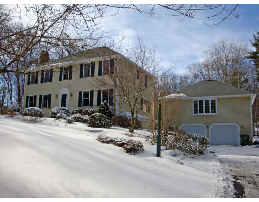 102 Barnett Road Sutton, MA 01590 - Photo 3 of 30 a front view of a house with yard and parking