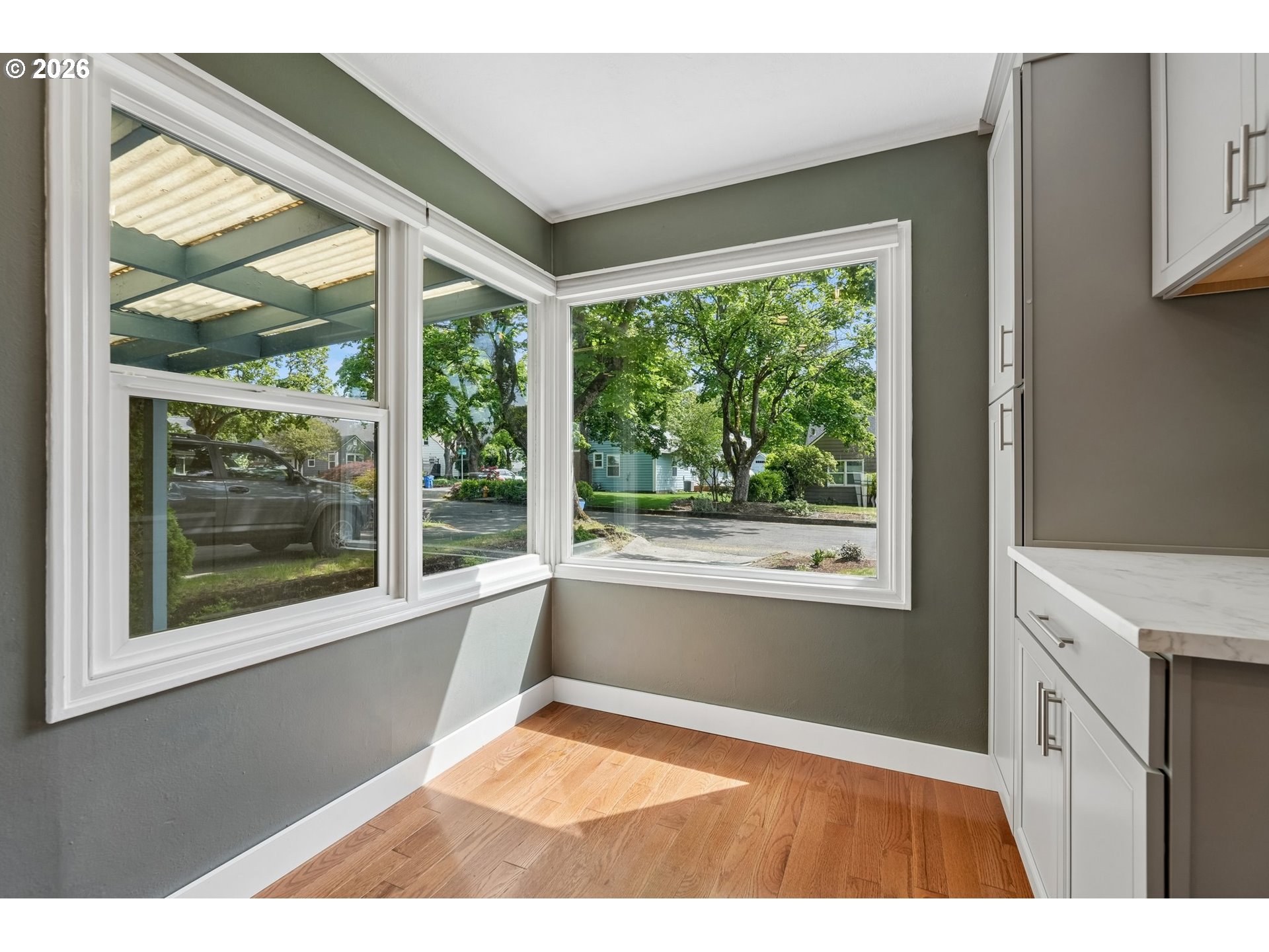 4204 Fir Street Vancouver, WA 98660 - Photo 12 of 37 a open kitchen with wooden floor and a fireplace