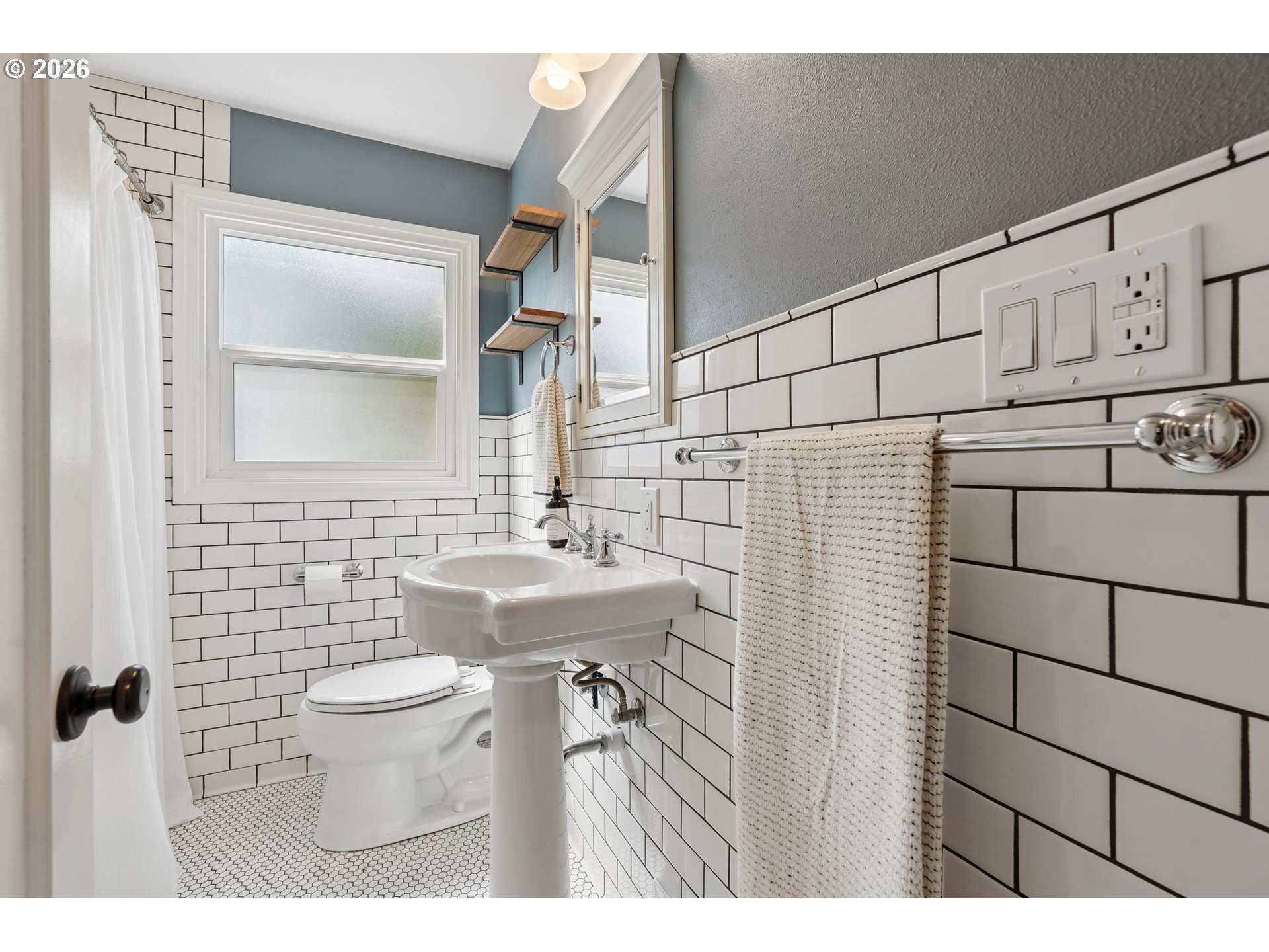 4204 Fir Street Vancouver, WA 98660 - Photo 16 of 37 a bathroom with a sink toilet and shower