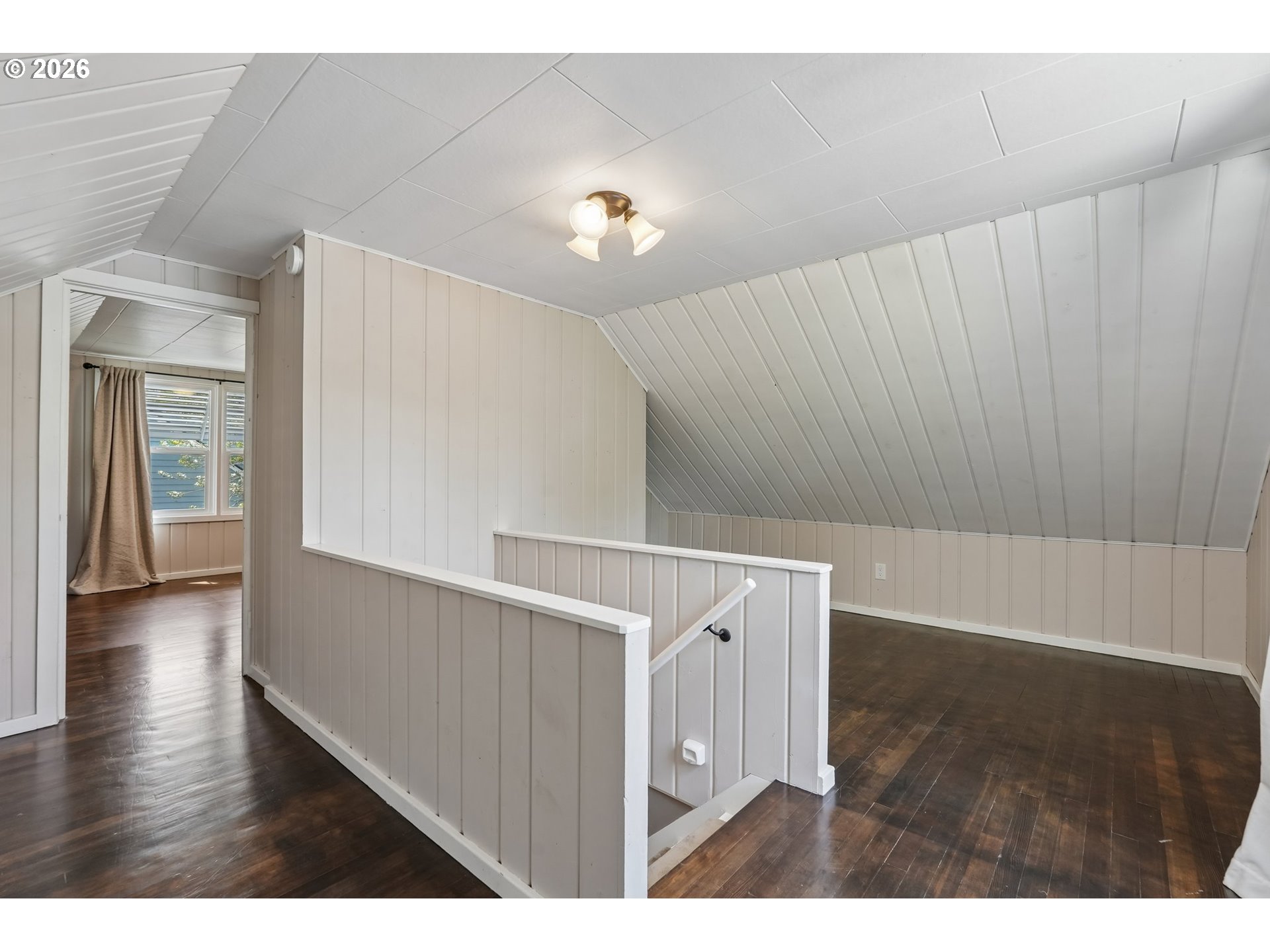 4204 Fir Street Vancouver, WA 98660 - Photo 20 of 37 a view of an empty room with wooden floor