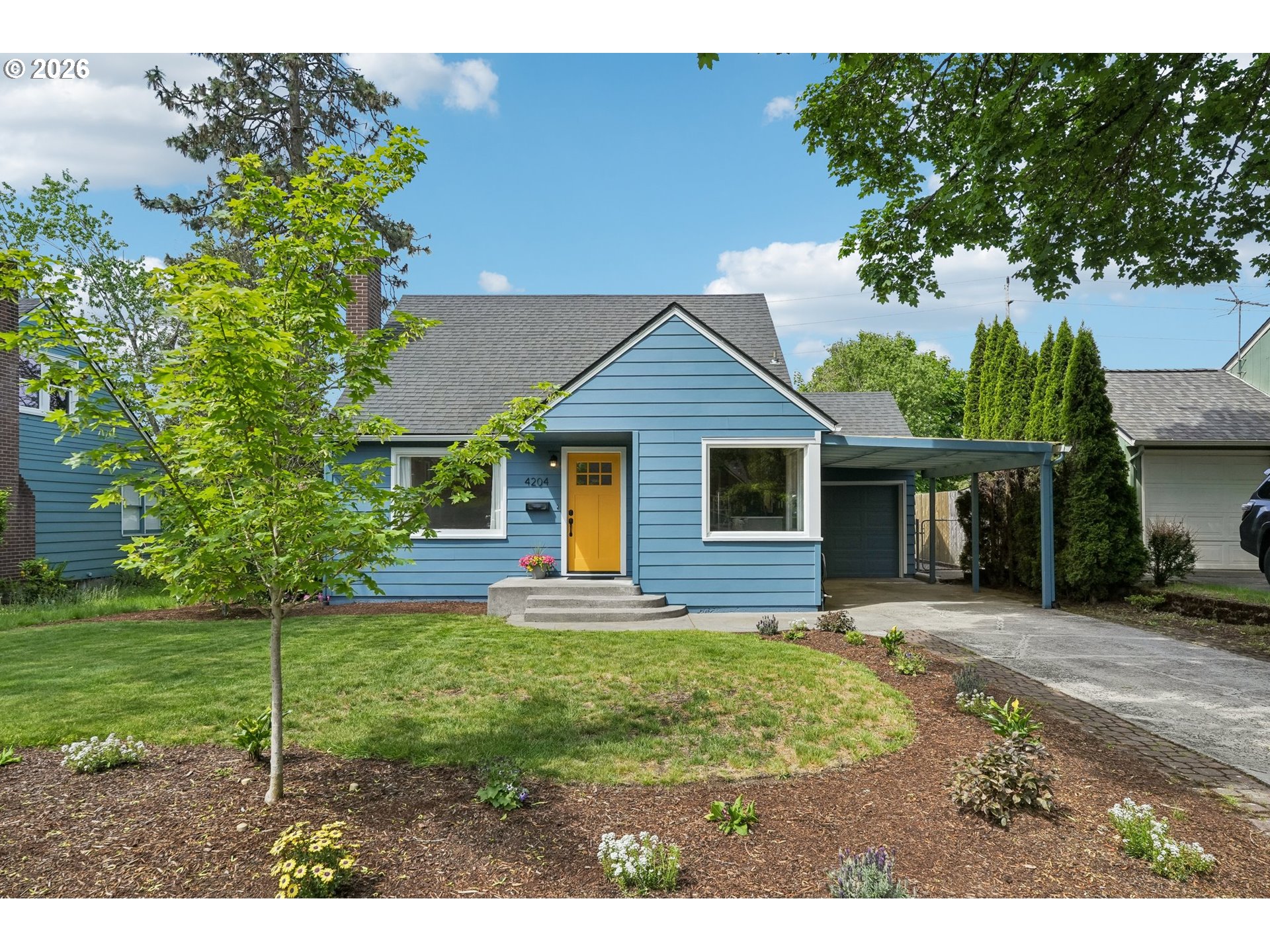 4204 Fir Street Vancouver, WA 98660 - Photo 2 of 37 a view of a house with a yard