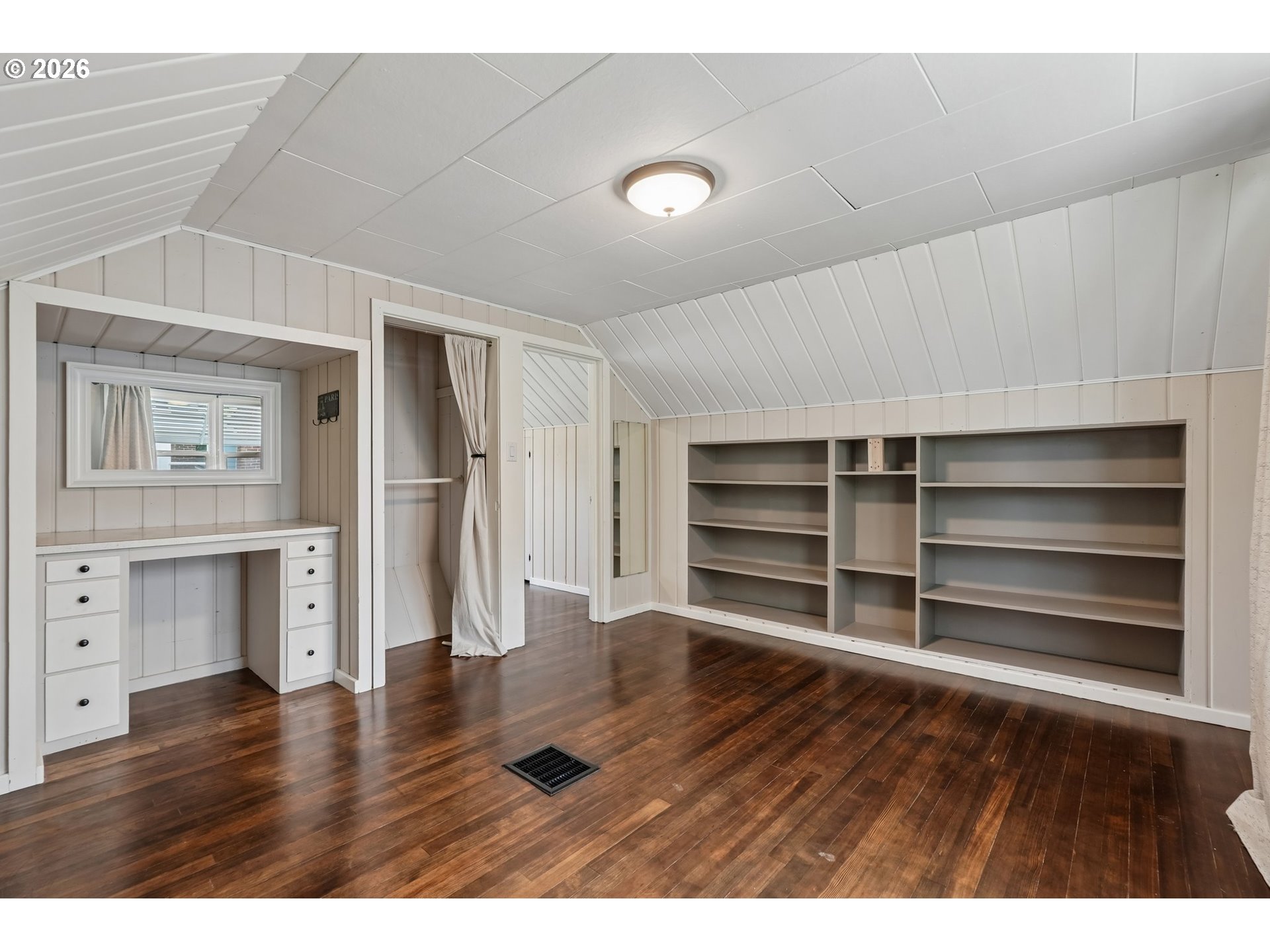 4204 Fir Street Vancouver, WA 98660 - Photo 24 of 37 a room with wooden floor and closet
