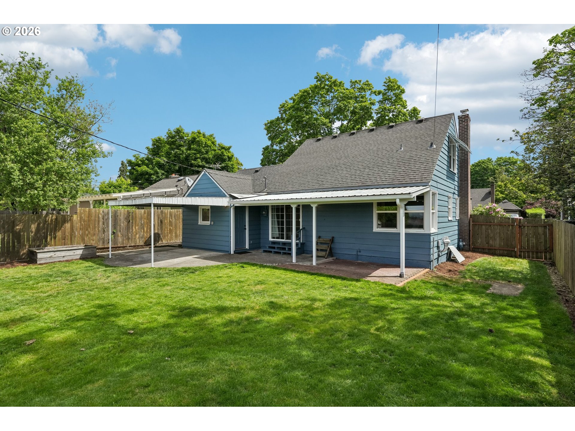 4204 Fir Street Vancouver, WA 98660 - Photo 35 of 37 a view of a house with a yard and garden