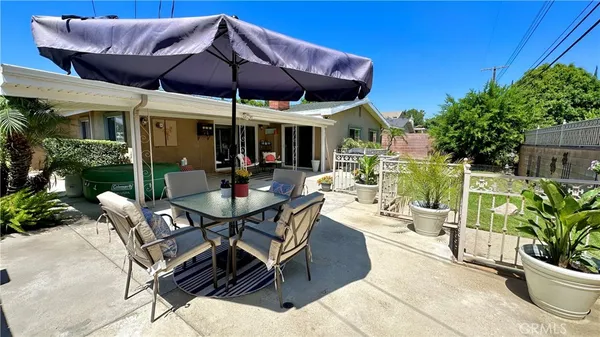 a view of a patio with a sitting area