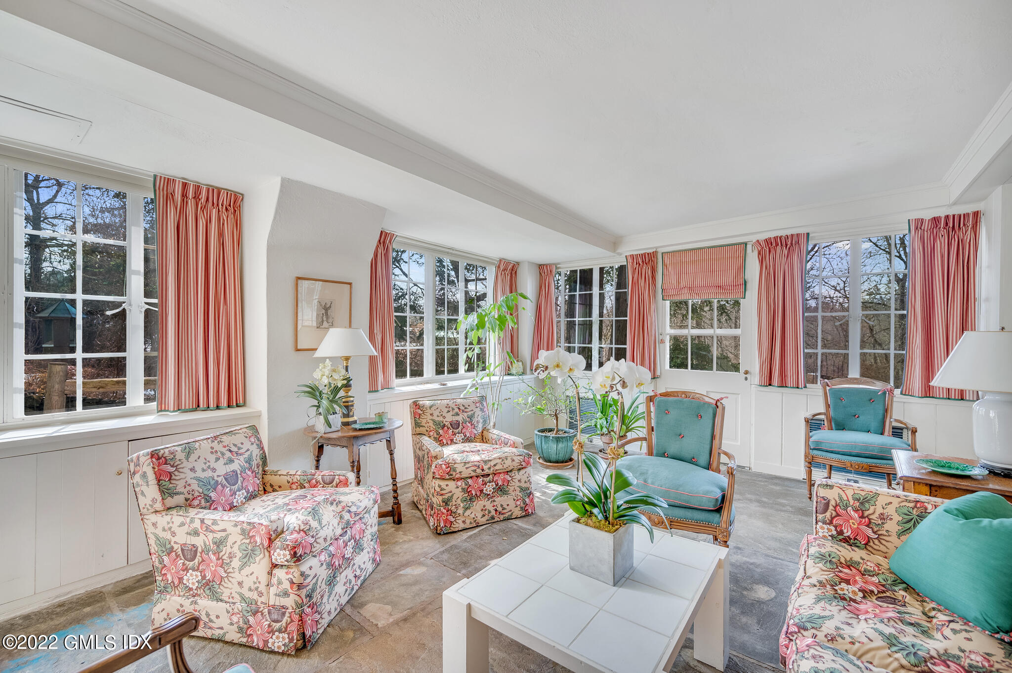 74 Round Hill Road Greenwich, CT 06831 - Photo 12 of 15 a living room with furniture and a large window
