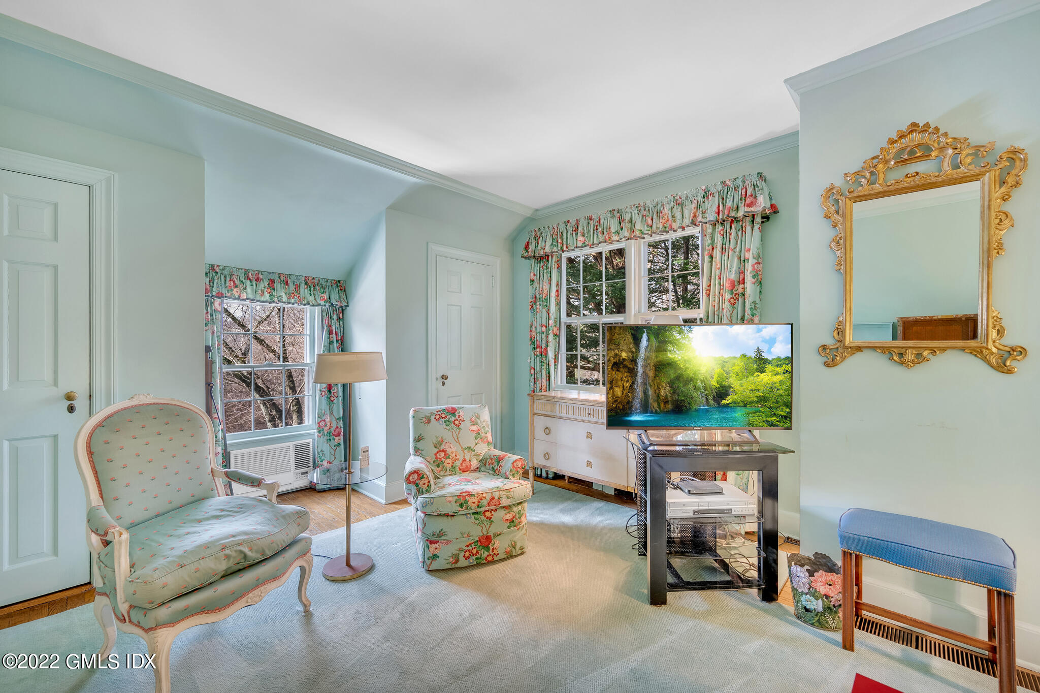 74 Round Hill Road Greenwich, CT 06831 - Photo 14 of 15 a living room with furniture and a flat screen tv