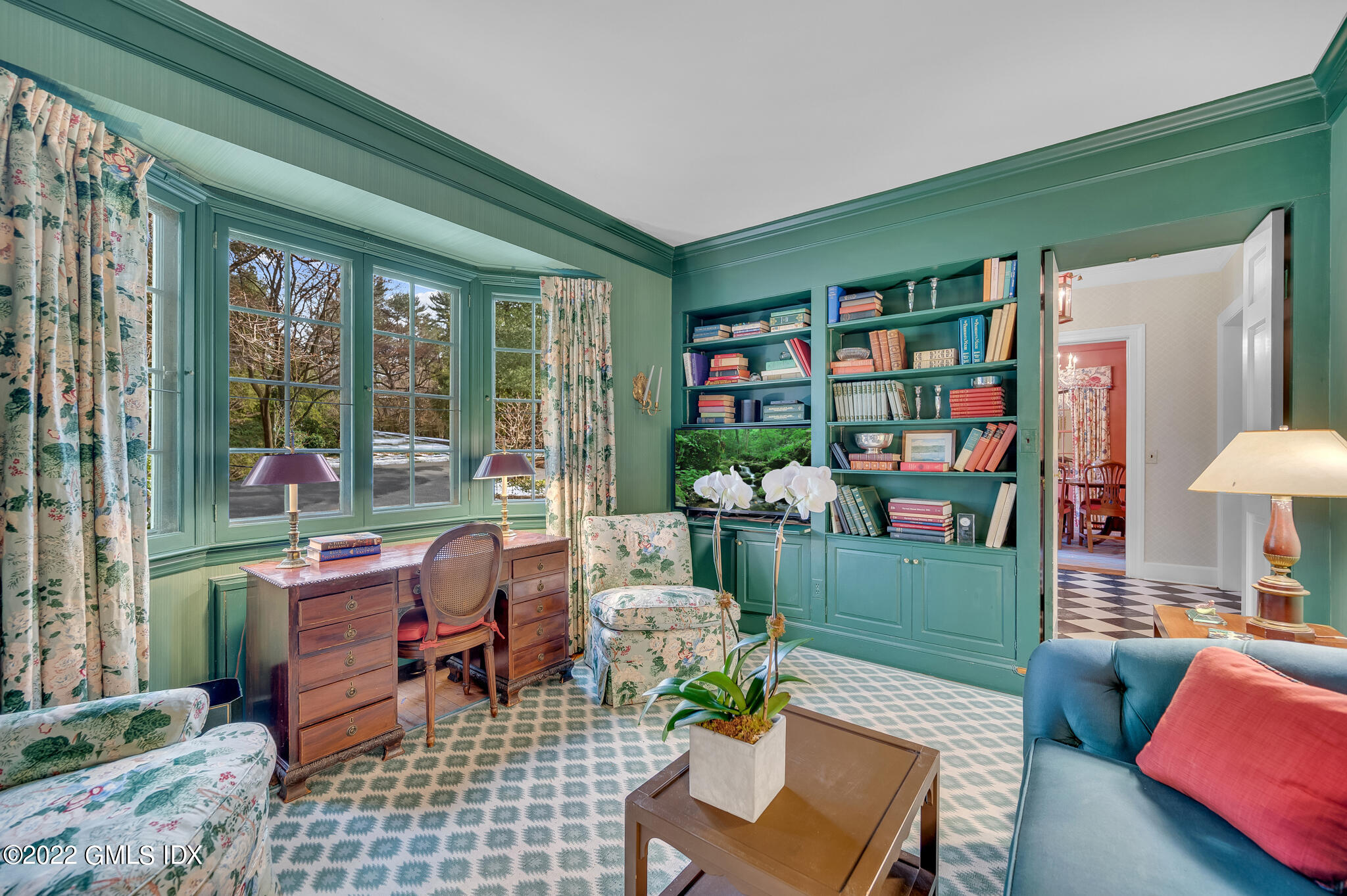 74 Round Hill Road Greenwich, CT 06831 - Photo 3 of 15 a living room with furniture and a book shelf