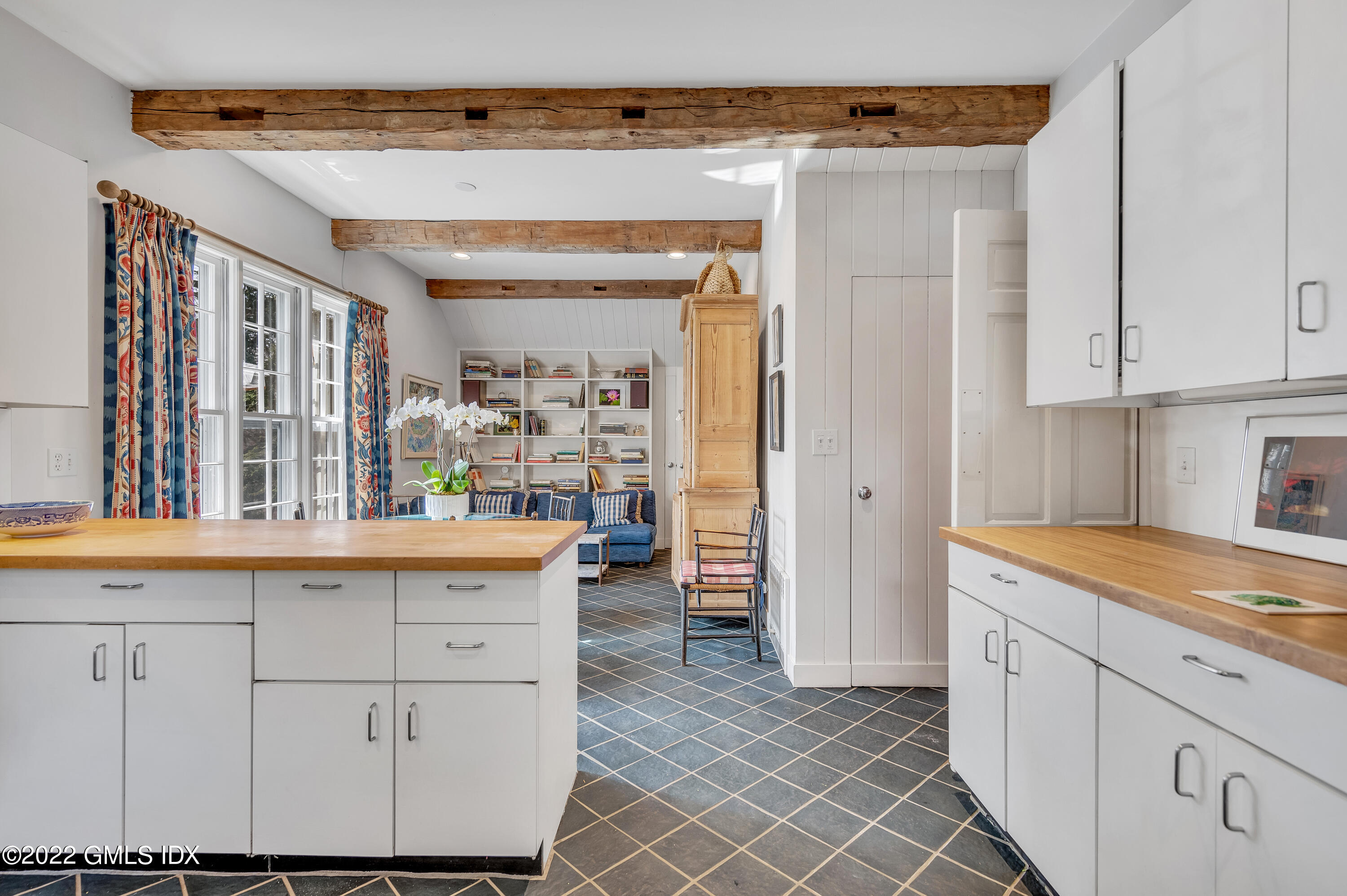 74 Round Hill Road Greenwich, CT 06831 - Photo 8 of 15 a kitchen with stainless steel appliances granite countertop a sink and cabinets